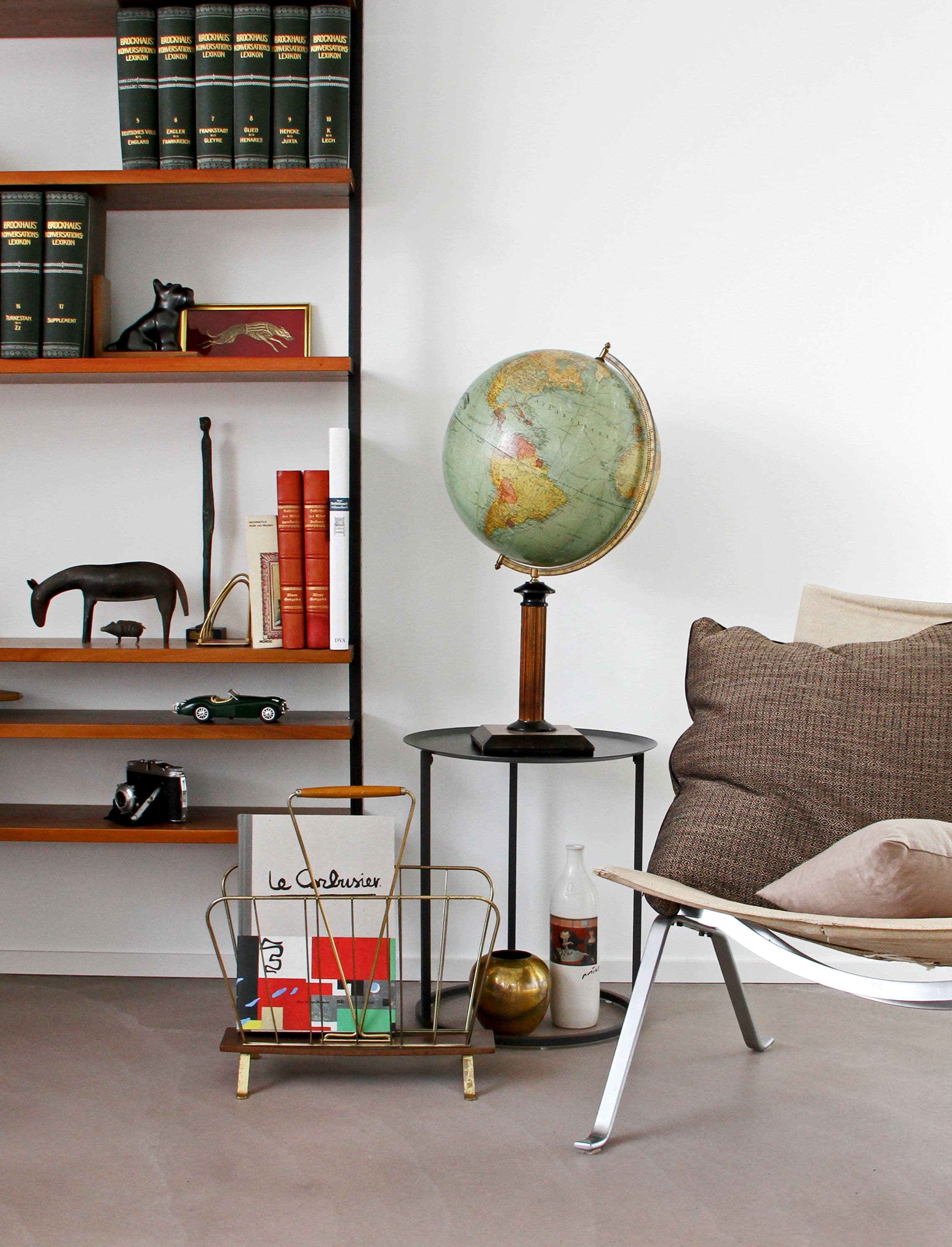 A curated shelf of vintage curiosities and decorative objects